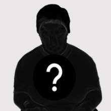 A silhouette of a person with a white question mark in the middle