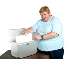 A person going through a cabinet filled with documents