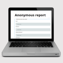 photo of an anonymous report form on a laptop